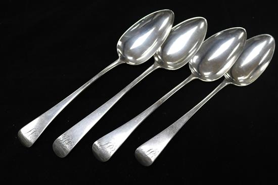 Four early 19th century Old English pattern silver table spoons.